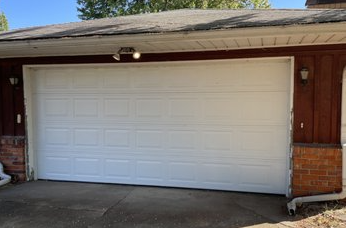 Modern garage door installed by the best garage door services in Orange County, featuring a sleek design and smooth operation.